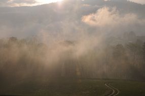 Beautiful landscape with the mountains,clouds and sunset