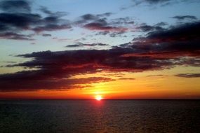 Beautiful and colorful sunset on the lake horizon in Michigan in the evening