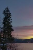 landscape of sunrise on the canim lake in winter