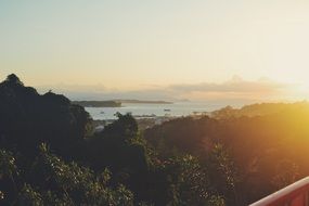 view from the slope of the boat at sunset