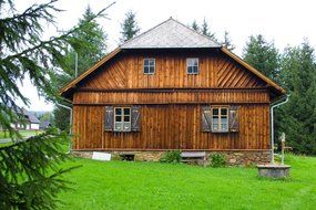 wooden cottage near forest