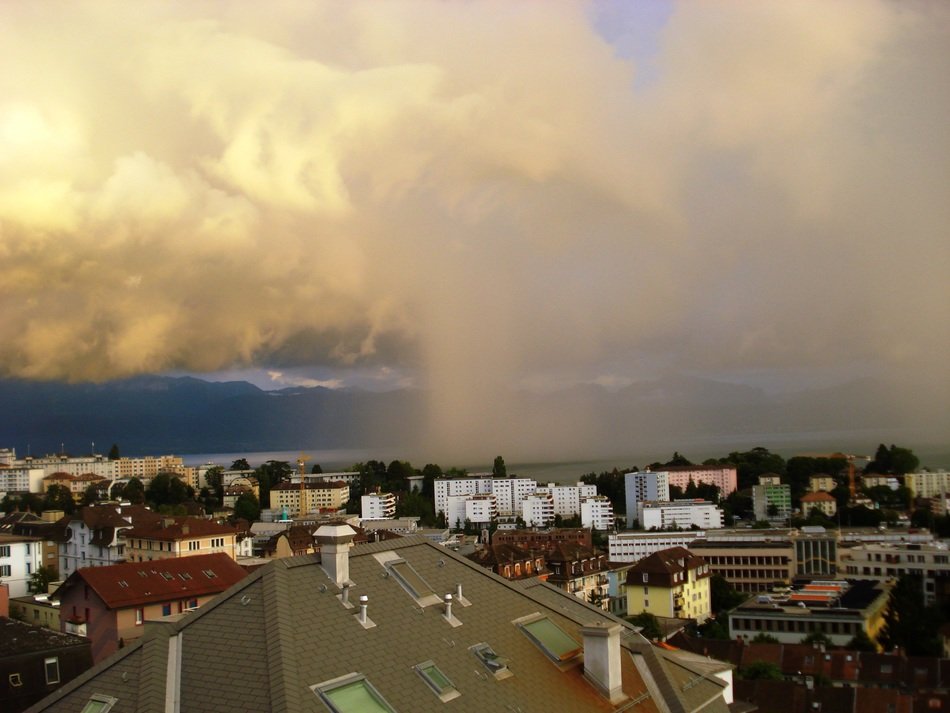 rain clouds over the city