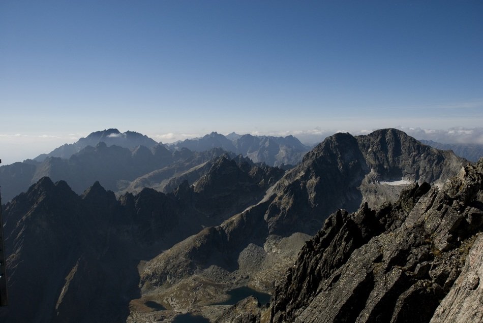panoramic view of mountain peaks in the Tatra mountains on a sunny day