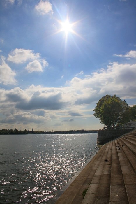 bright sun over the river in germany