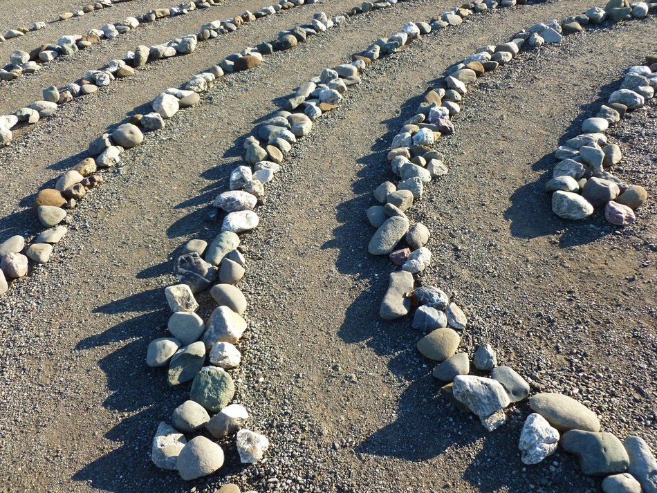 Stones laid out in a row for meditation.