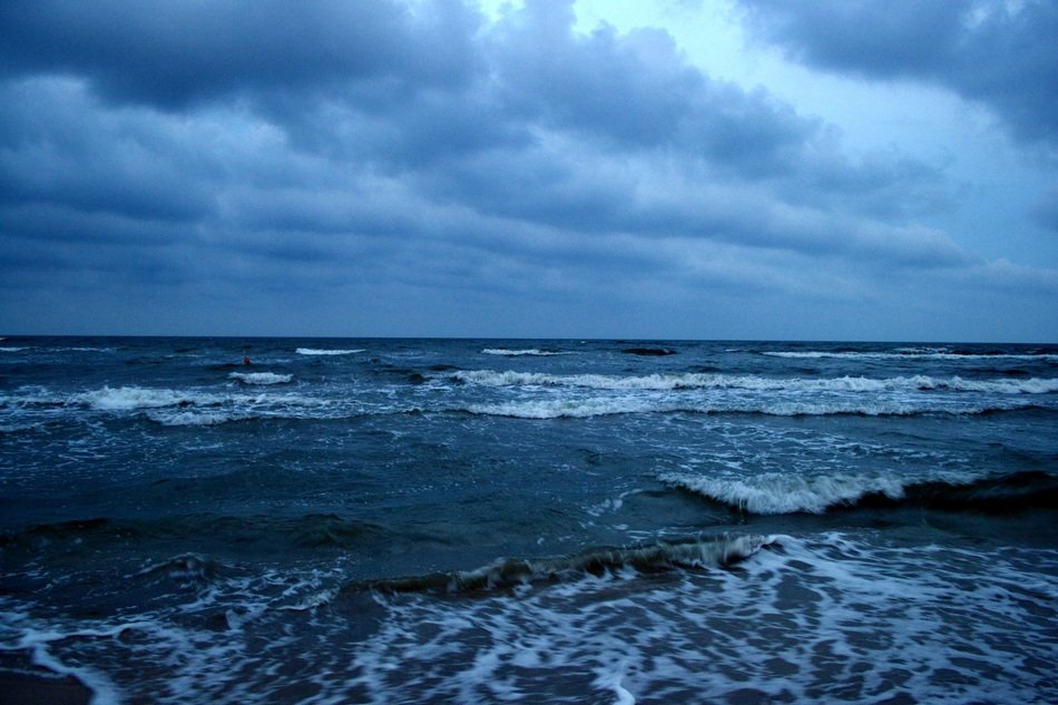 storm on the black sea in the blue twilight