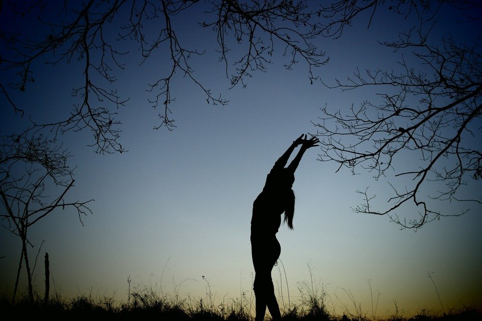 girl in the movement at sunset