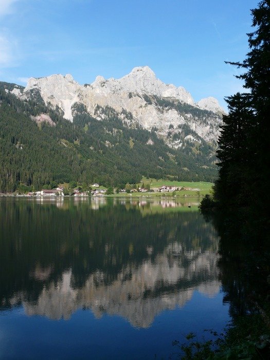 reflected in a lake of the Bavarian Alps