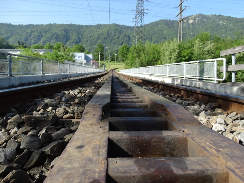 rack railway with the green mountains on background