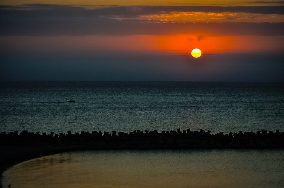 Panorama with the beautiful and colorful sunset above the ocean