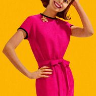Smiling Woman Wearing Pink Dress