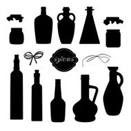 Set of different jars for spices and oil with ribbons