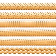 Golden metal chains on white