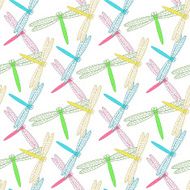 Seamless background of colorful dragonflies on a white