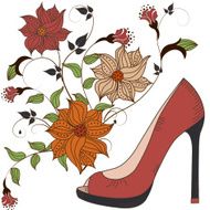 Women&#039;s shoes on a beautiful floral background