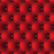 The red and black tab upholstery with jewelry pattern background