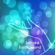 Stock blurred texture with bokeh effect and stylized hand in