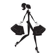 Woman walking carrying shopping bags