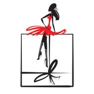 Woman in a red dress sitting on gift box