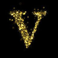 Sparkling letter V of glittering stars bokeh