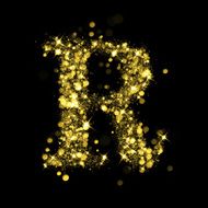 Sparkling letter R of glittering stars bokeh