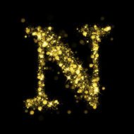 Sparkling letter N of glittering stars bokeh