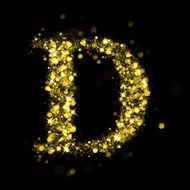 Sparkling letter D of glittering stars bokeh