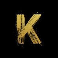 Gold glittering brush hand painted letter K