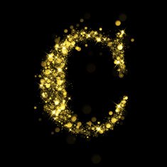 Sparkling letter C of glittering stars bokeh