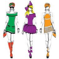 Three women in bright summer dresses