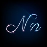 Diamond glittering letter N of sparkling brilliants