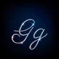 Diamond glittering letter G of sparkling brilliants