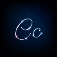 Diamond glittering letter C of sparkling brilliants