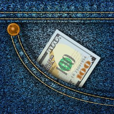 Money in the pocket of blue jeans