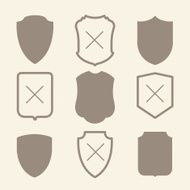 Vector illustration with simple silhouettes of shield