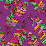 Seamless pattern of tribal ornate bird feathers