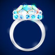 Silver ring with diamond against dark background