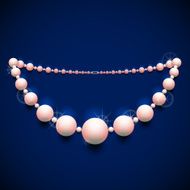 Pearl chaplet against dark background