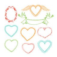 Doodle hand drawn heart shape frames and floral wreaths