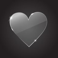 Glass heart on the black background vector