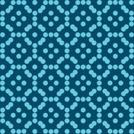 Halftone pattern of turquoise circles on background