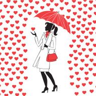 Woman with umbrella under the rain of red hearts
