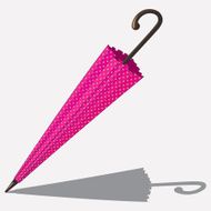 Closed pink colour umbrella with dots isolated