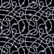 Glowing silver serpentine chains on black