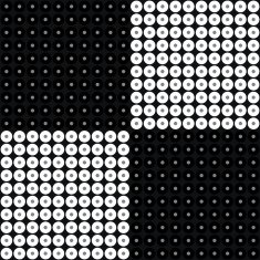 Seamless retro black and white polka dots background