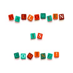Word "halloween is coming" with colorful blocks