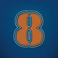 Number 8 made from leather on jeans background