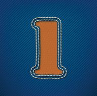 Number 1 made from leather on jeans background