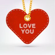 Heart Label tag hanging on golden chain