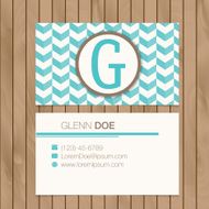 Business card with alphabet letter on a wood background N9
